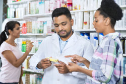 pharmacist with customer